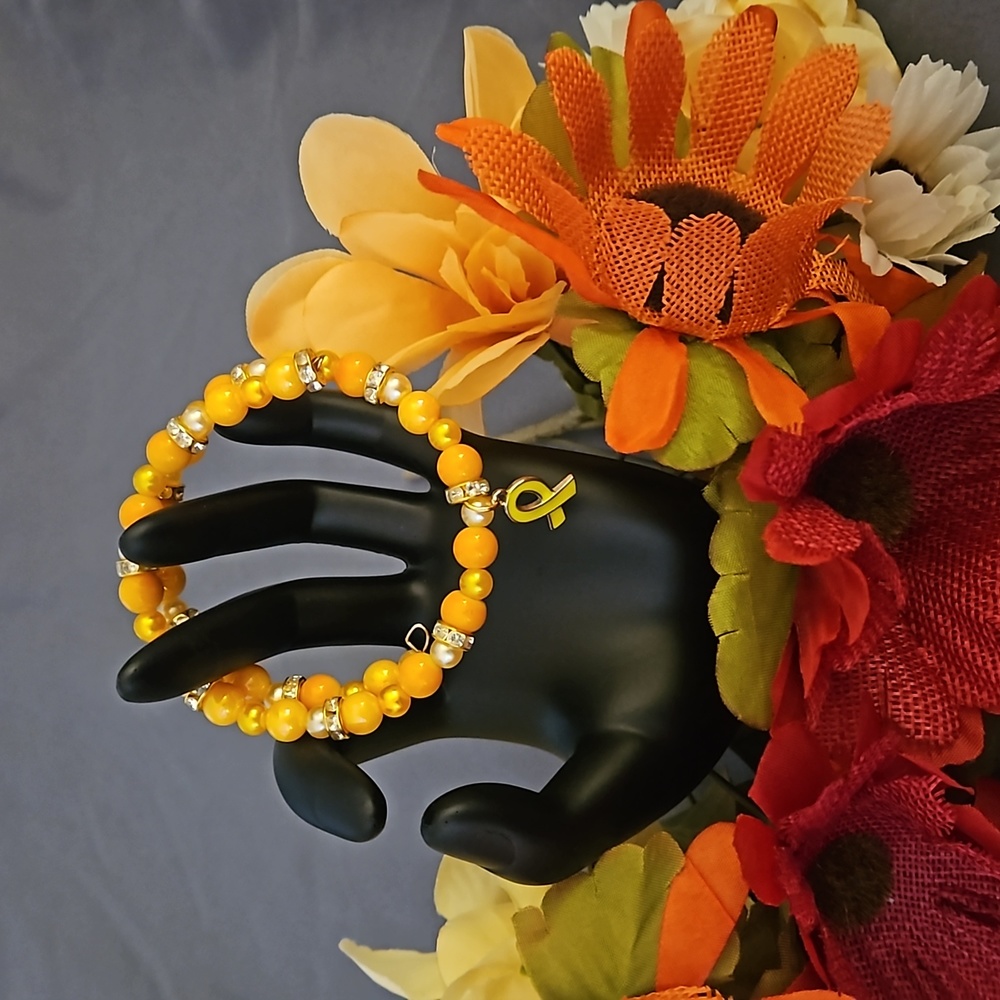 NWOT Yellow Ribbon Charm Memory Wired Bracelet  - 1002